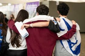 Group of people celebrating on stage