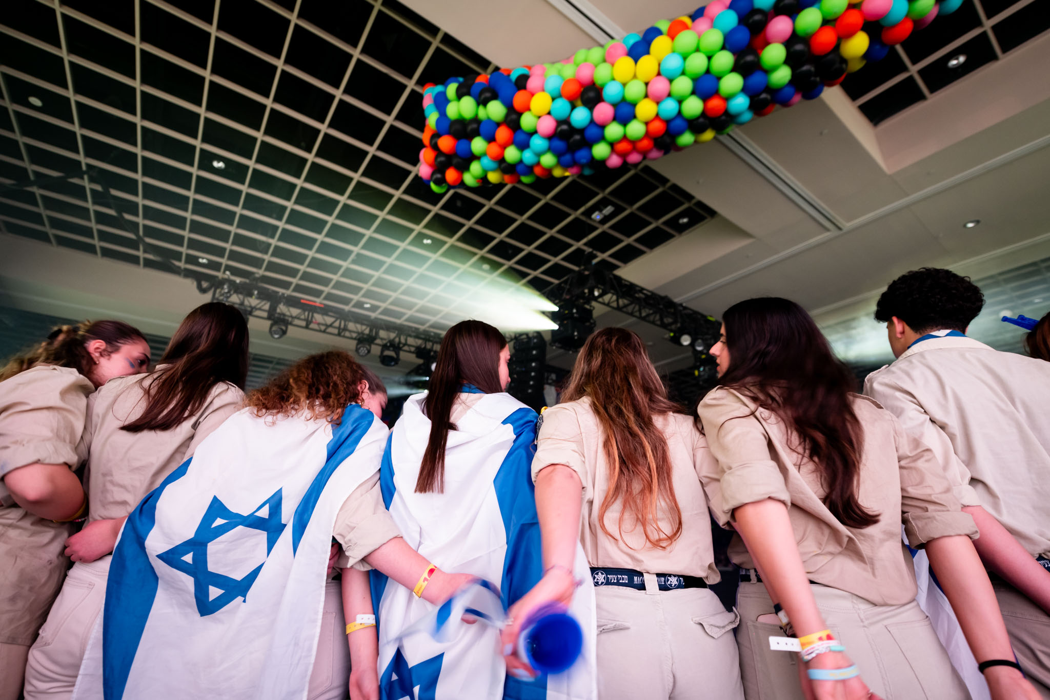 Group of people celebrating on stage
