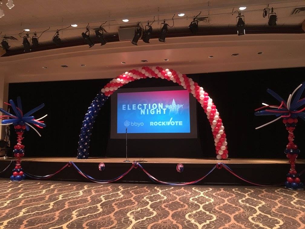 Group of people celebrating on stage