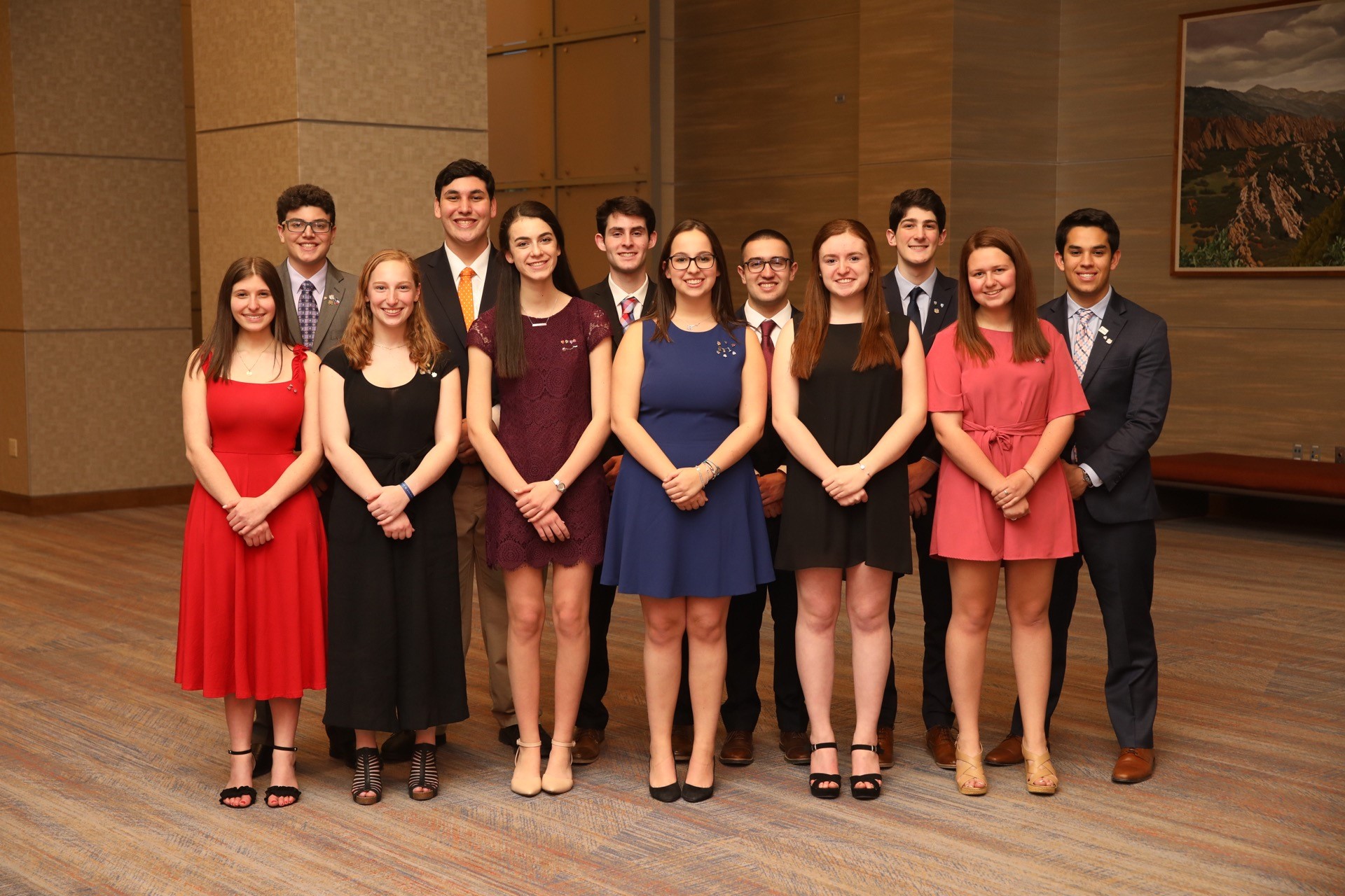 Group of people celebrating on stage