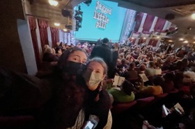 Group of people celebrating on stage