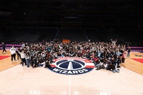 Group of people celebrating on stage
