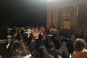 Group of people celebrating on stage