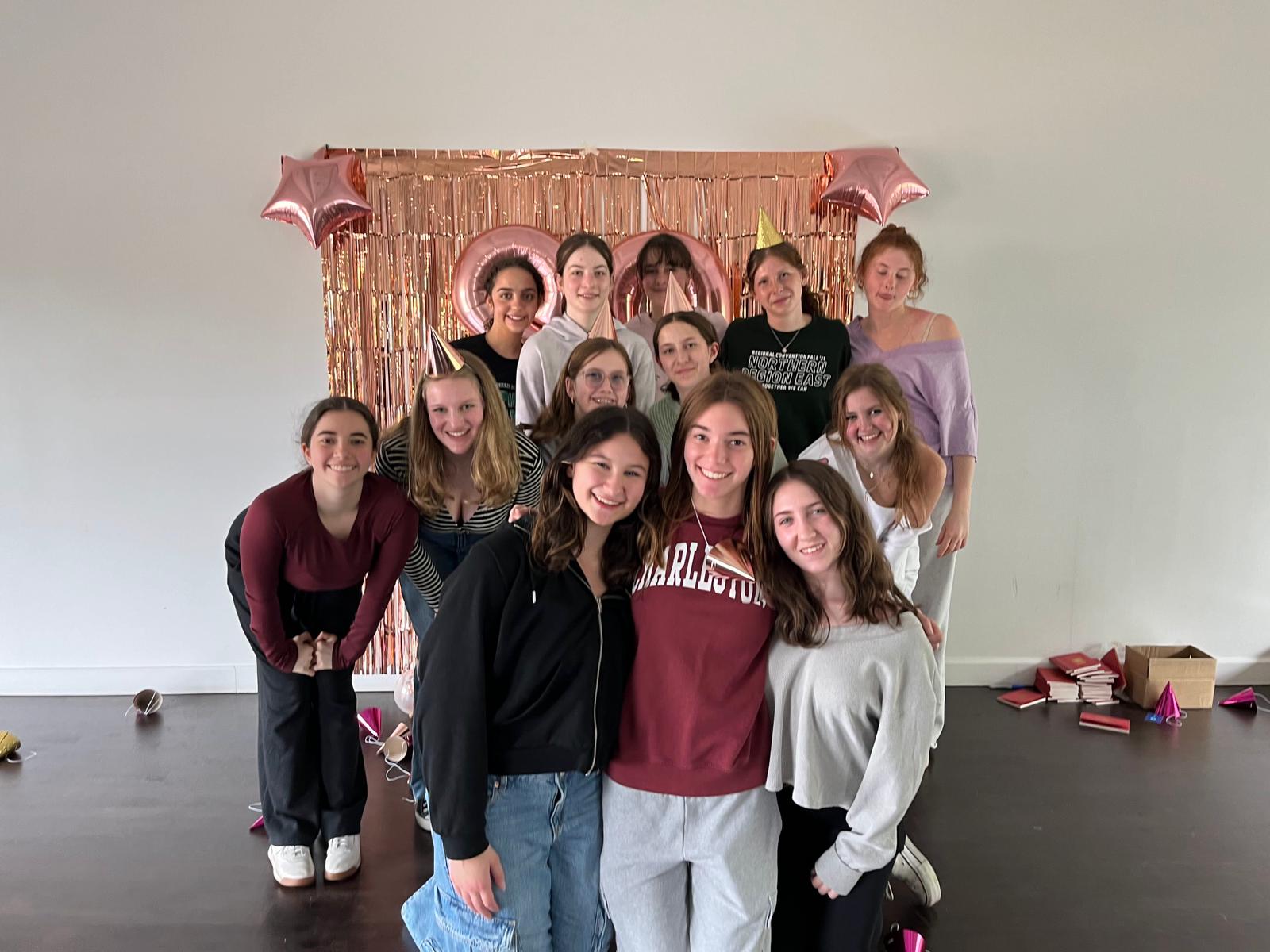 Group of people celebrating on stage