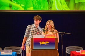 Group of people celebrating on stage
