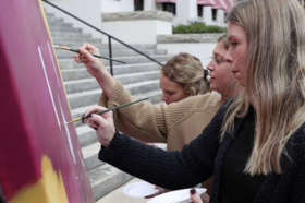 Group of people celebrating on stage