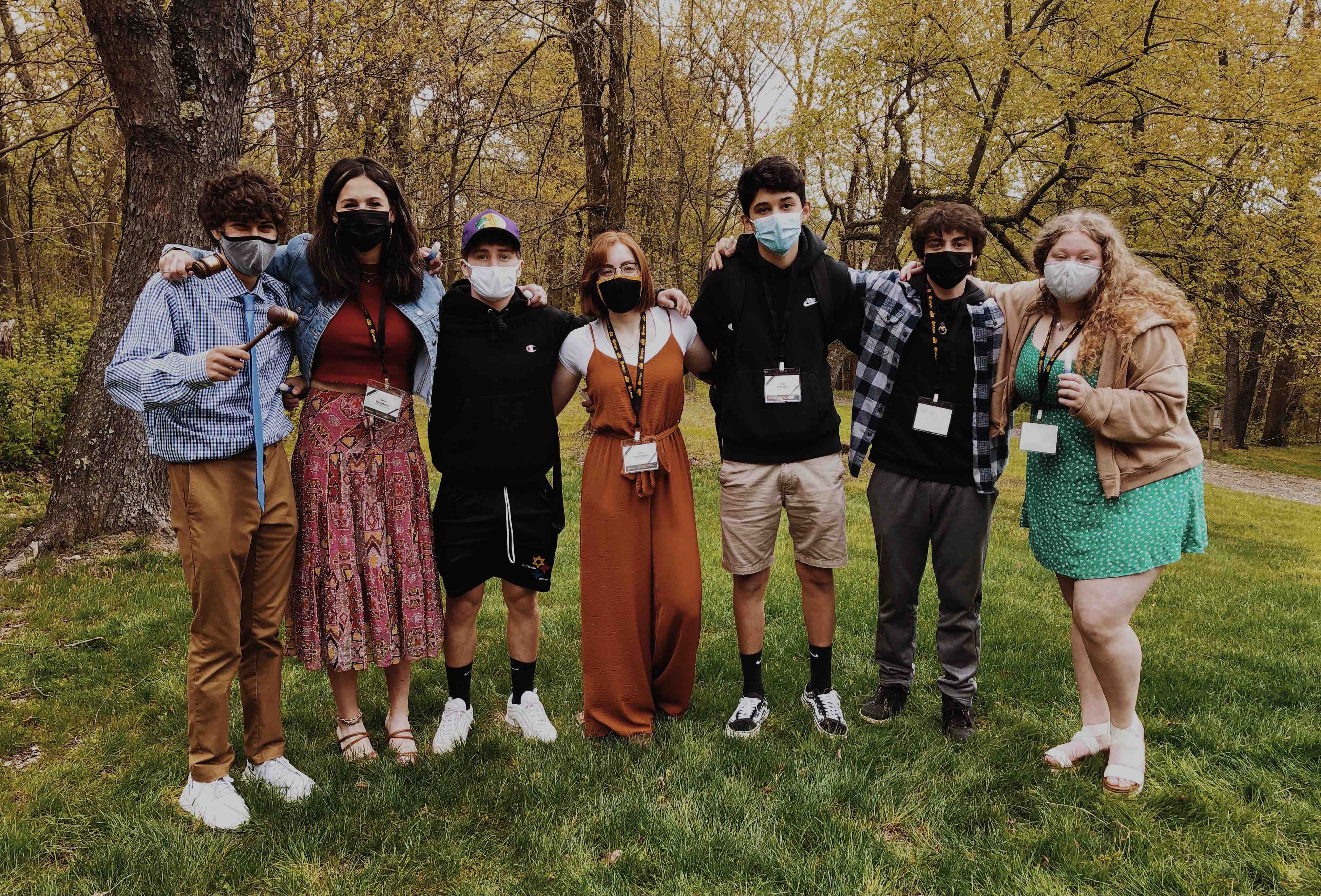 Group of people celebrating on stage