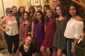 Group of people celebrating on stage