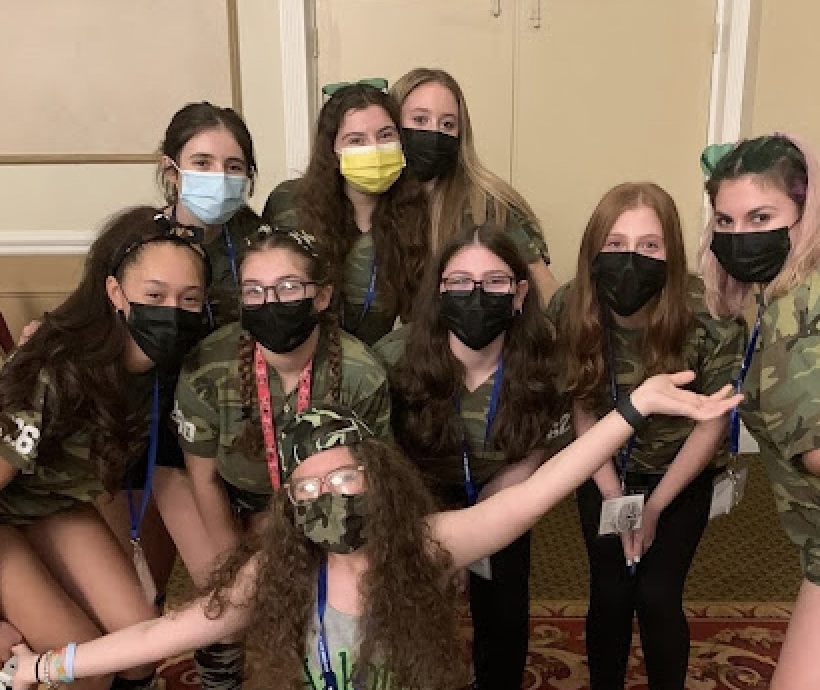 Group of people celebrating on stage