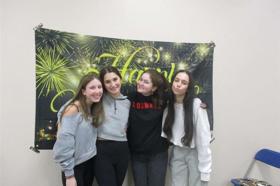 Group of people celebrating on stage