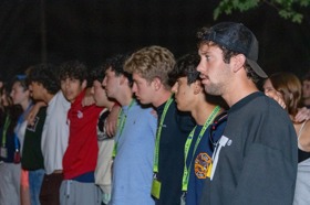 Group of people celebrating on stage