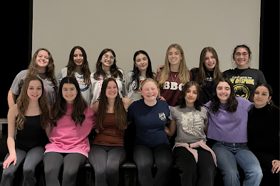 Group of people celebrating on stage