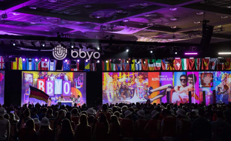 Group of people celebrating on stage