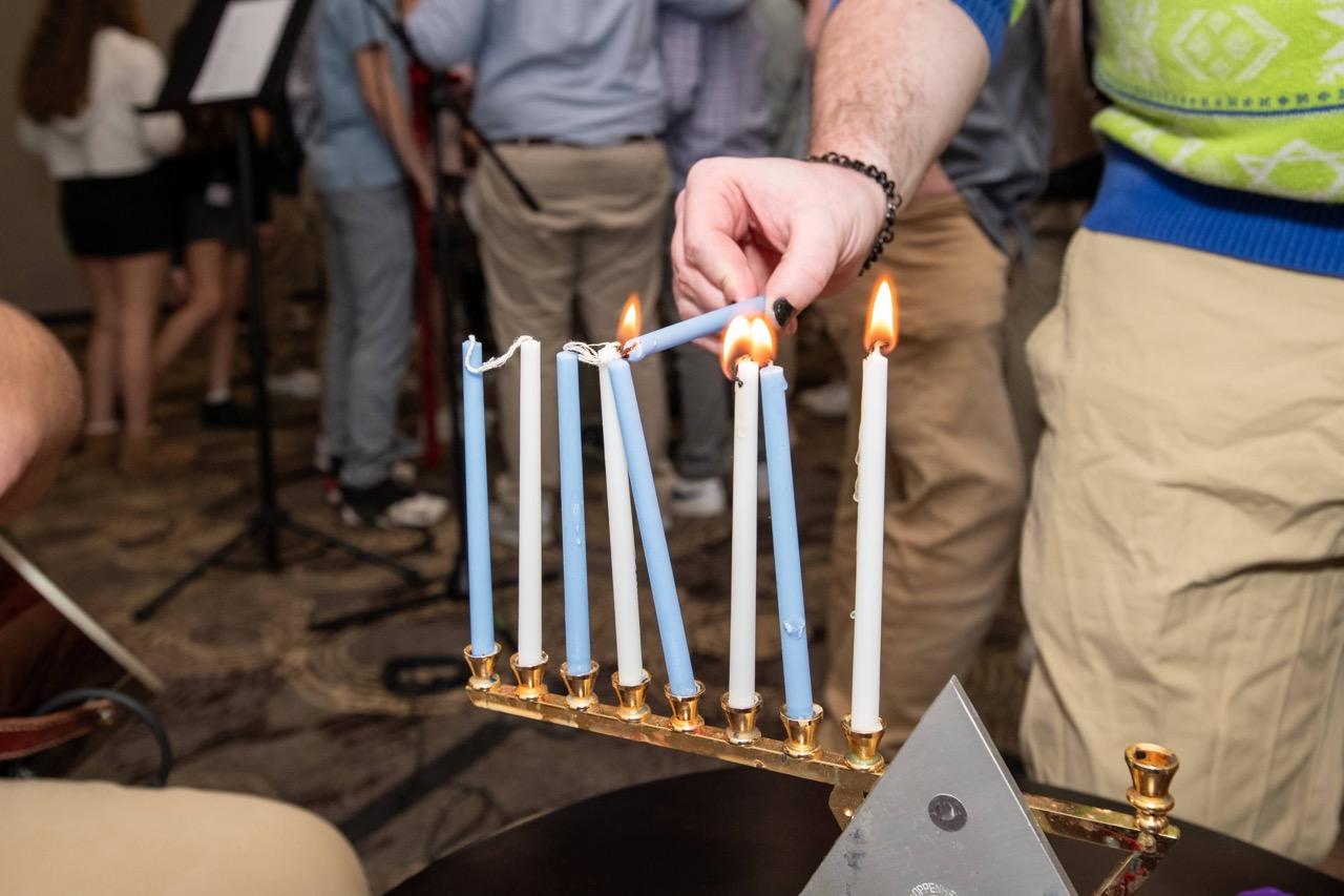 Group of people celebrating on stage