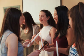 Group of people celebrating on stage