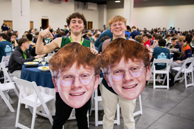 Group of people celebrating on stage