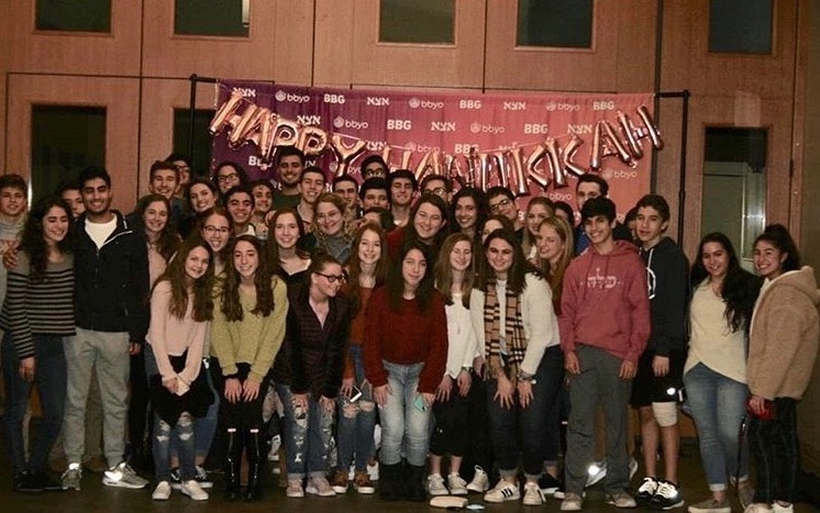 Group of people celebrating on stage