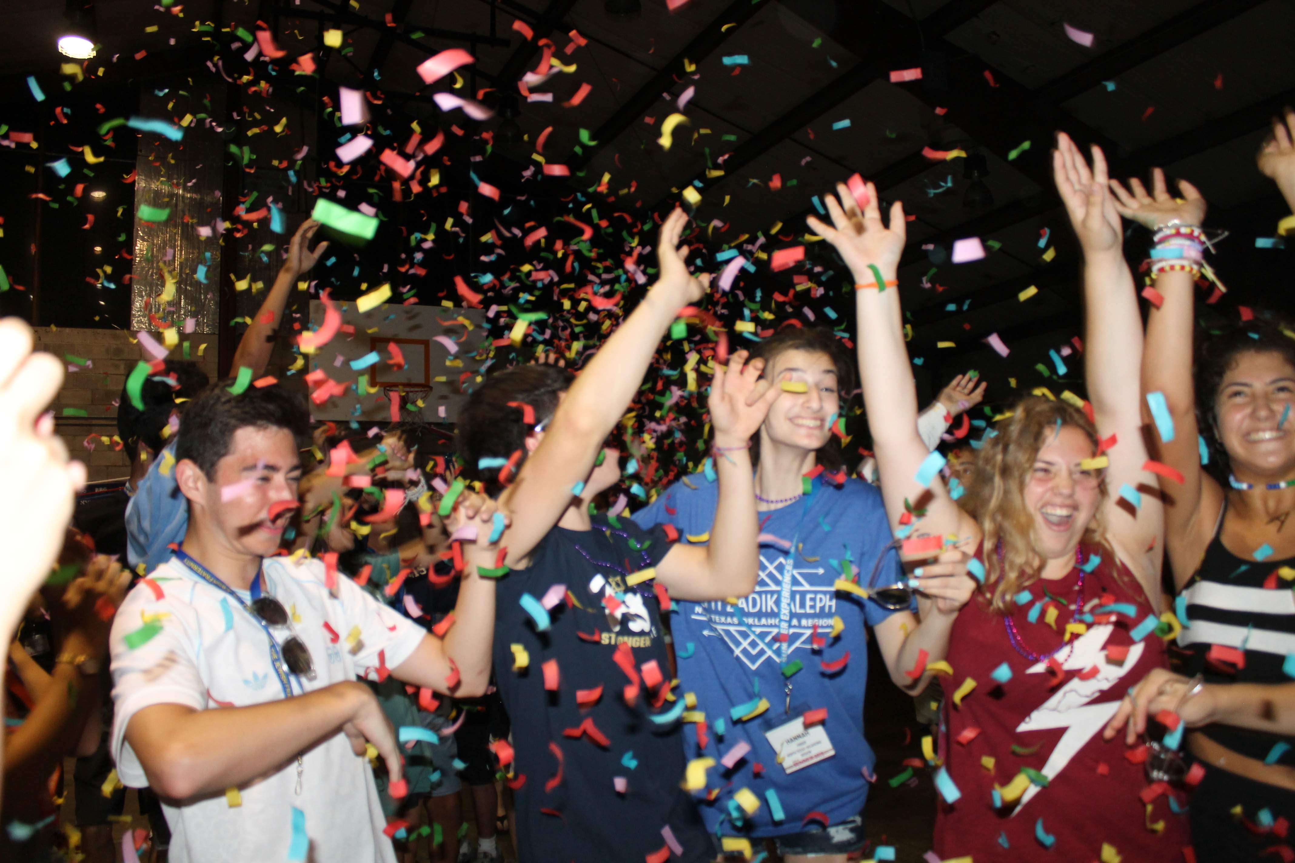 Group of people celebrating on stage