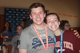 Group of people celebrating on stage