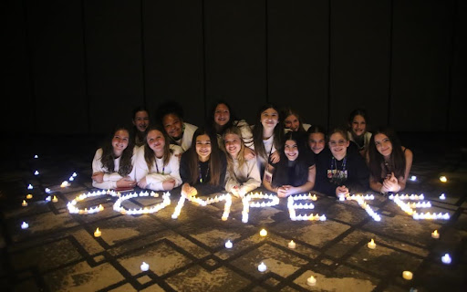 Group of people celebrating on stage