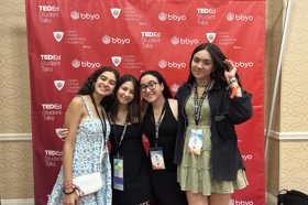 Group of people celebrating on stage