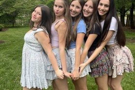 Group of people celebrating on stage