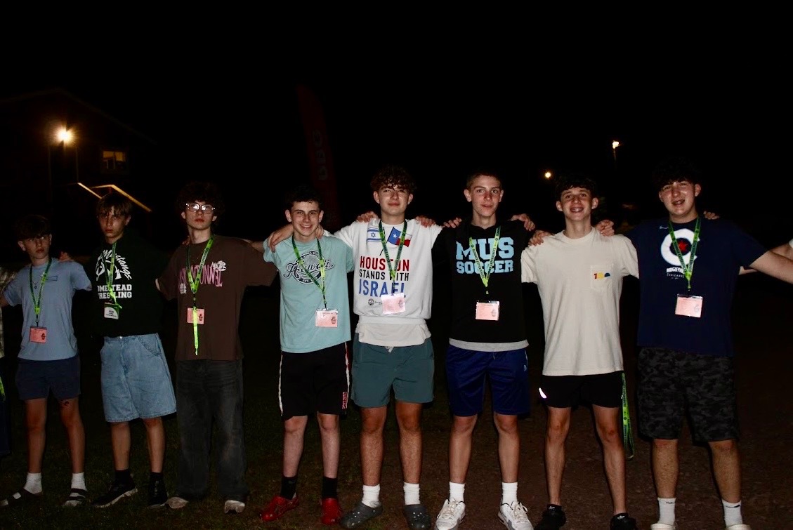 Group of people celebrating on stage