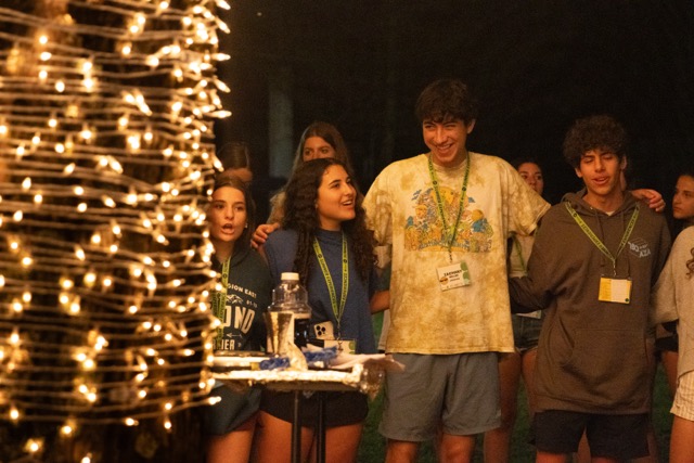 Group of people celebrating on stage