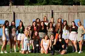 Group of people celebrating on stage