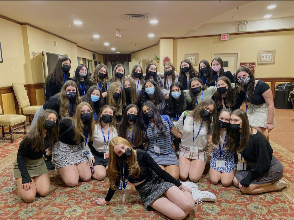 Group of people celebrating on stage