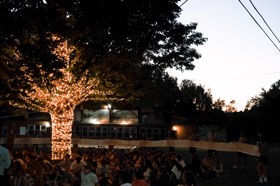 Group of people celebrating on stage