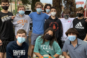 Group of people celebrating on stage