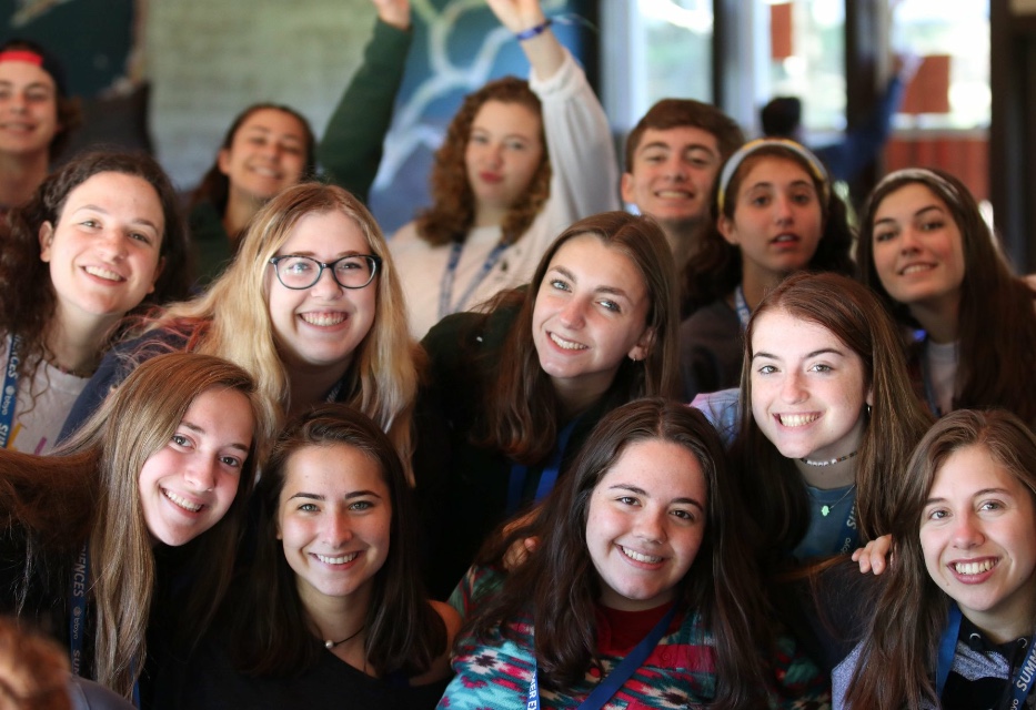 Group of people celebrating on stage