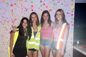 Group of people celebrating on stage