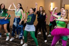 Group of people celebrating on stage