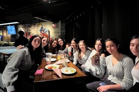 Group of people celebrating on stage