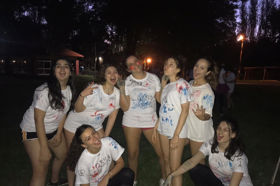 Group of people celebrating on stage