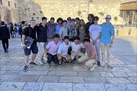 Group of people celebrating on stage