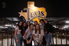 Group of people celebrating on stage