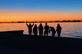 Group of people celebrating on stage