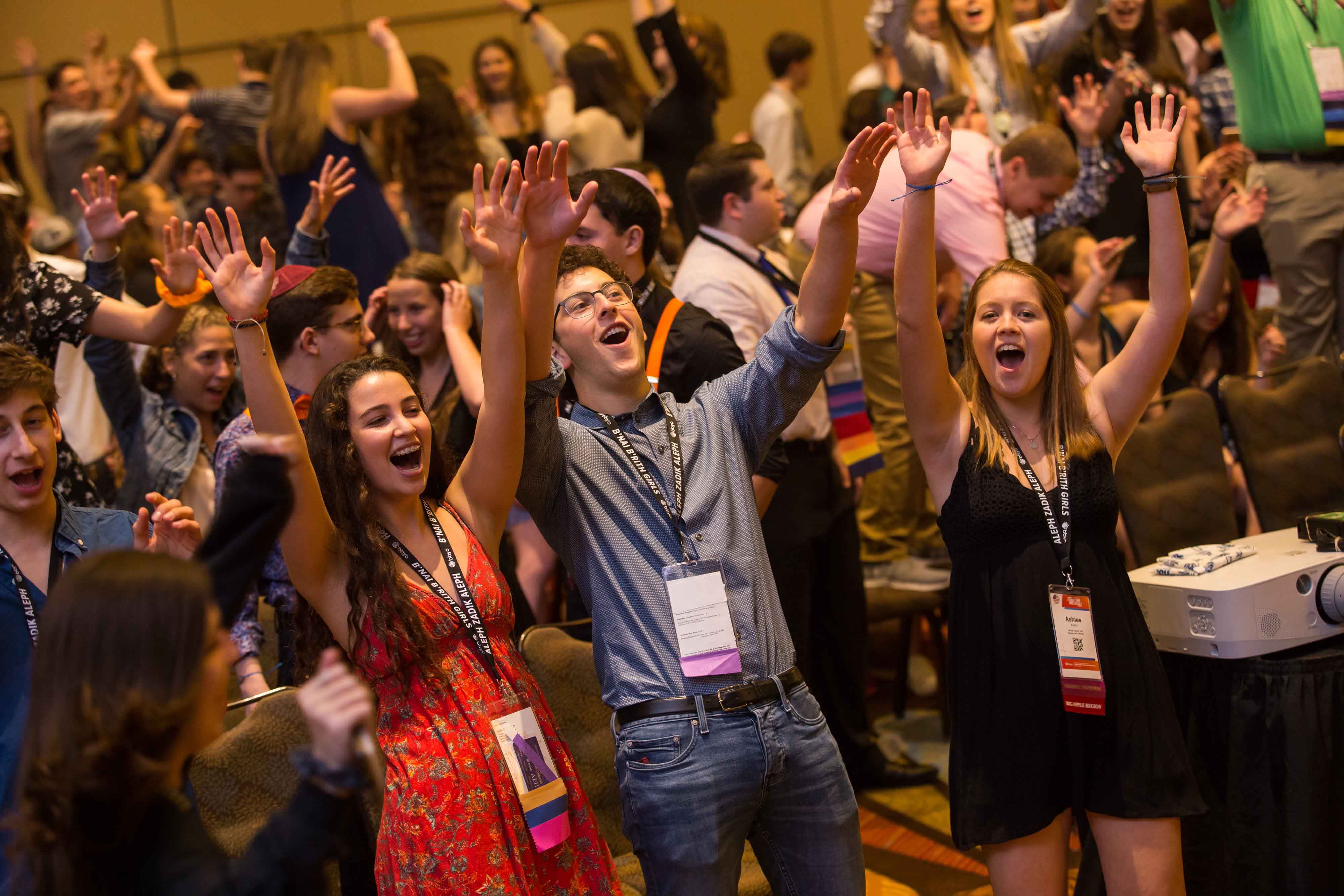 Group of people celebrating on stage