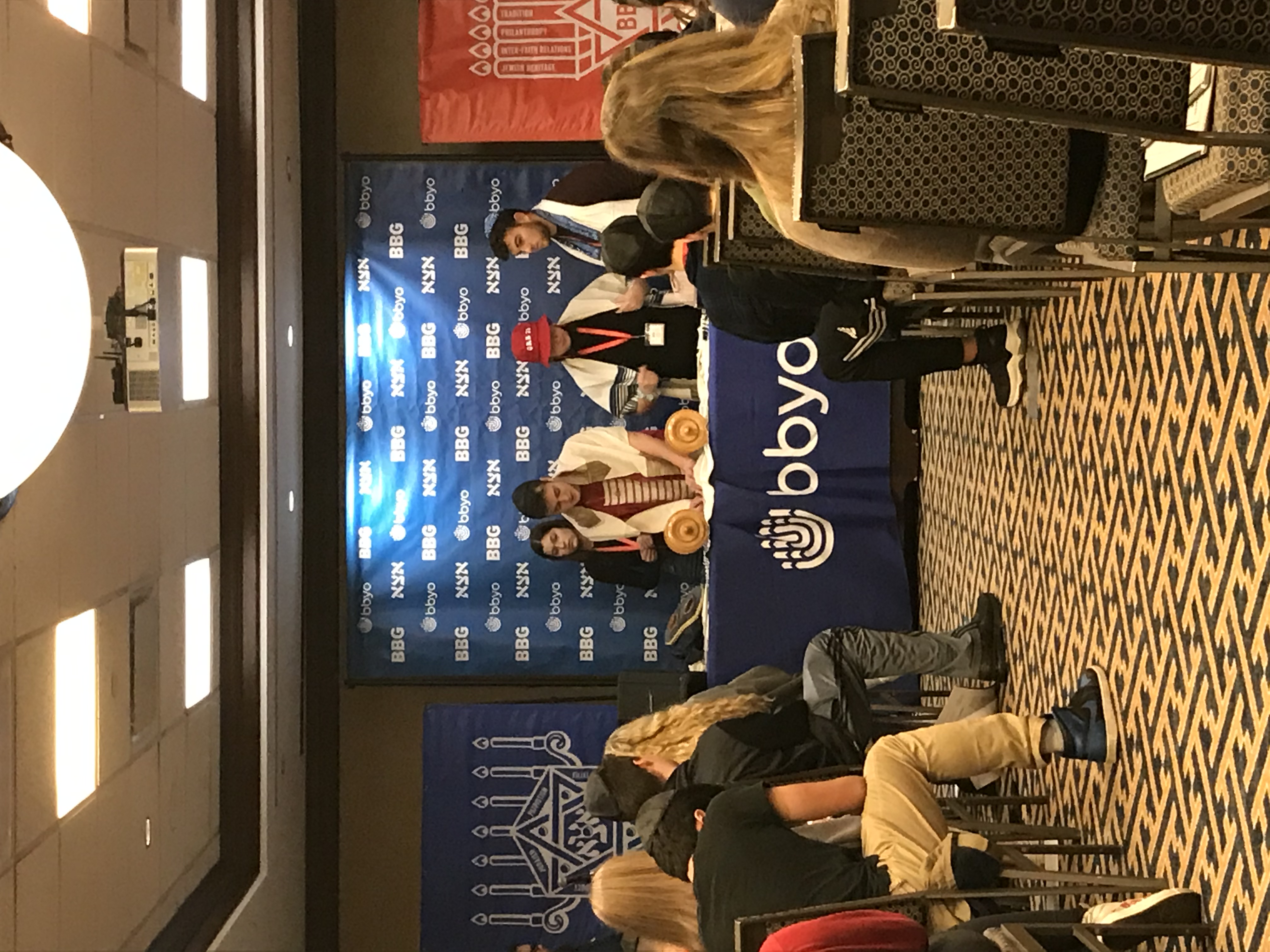 Group of people celebrating on stage