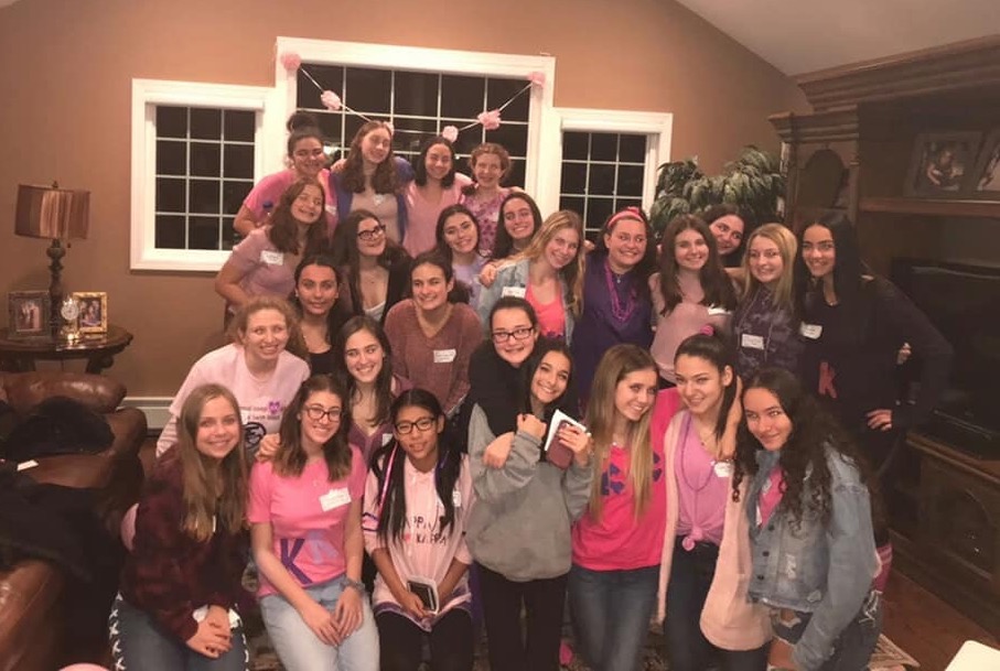 Group of people celebrating on stage