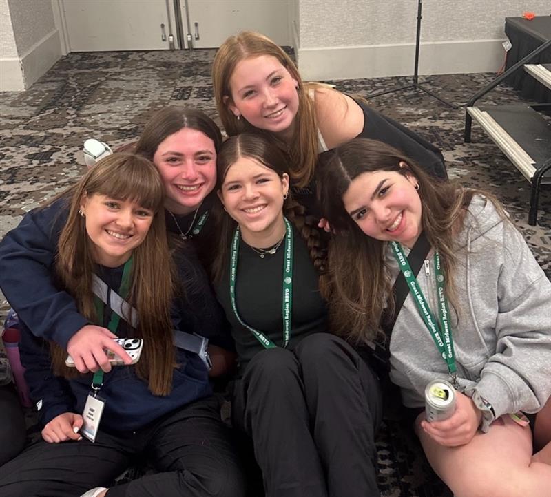 Group of people celebrating on stage