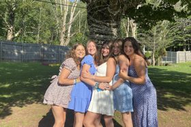 Group of people celebrating on stage