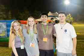 Group of people celebrating on stage