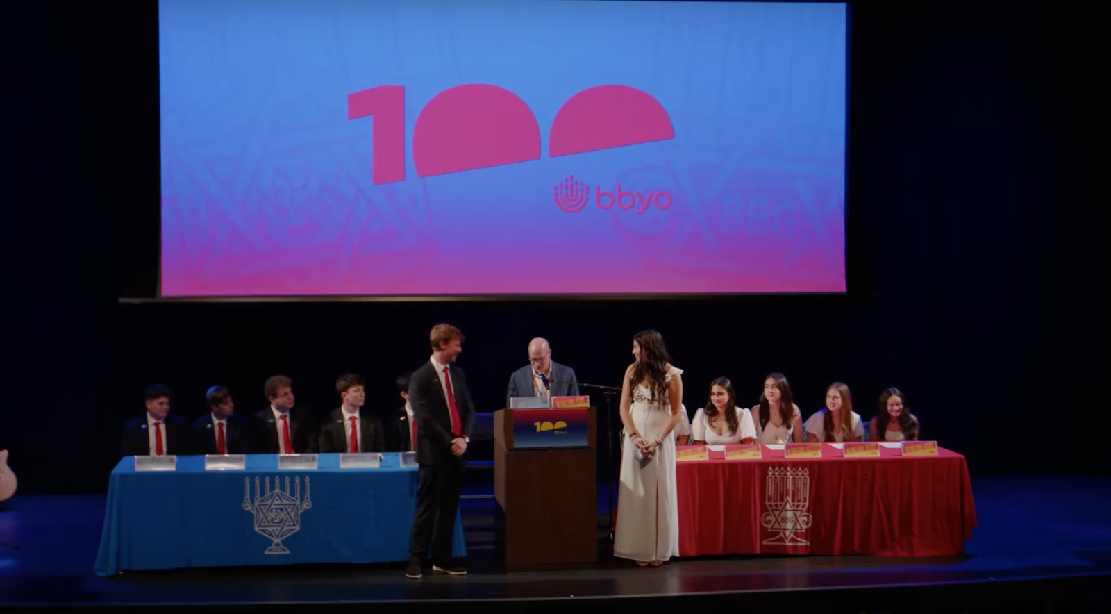 Group of people celebrating on stage