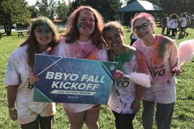 Group of people celebrating on stage