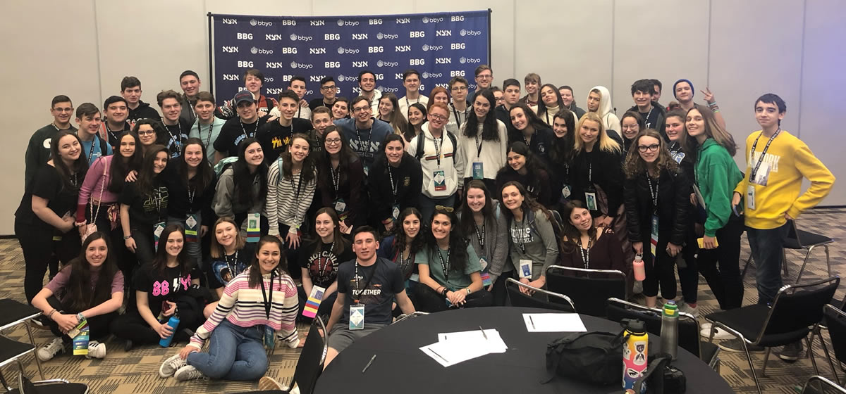 Group of people celebrating on stage