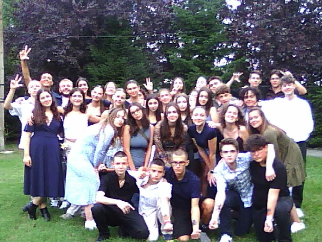 Group of people celebrating on stage